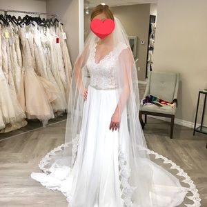 never used wedding dress- Madison James
